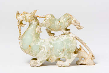 A CHINESE JADE CHIMERA WITH WHITE CALCIFICATION