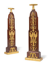 A PAIR OF EMPIRE-STYLE ORMOLU-MOUNTED MAHOGANY DOORSTOPS