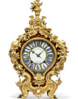 A LOUIS XV ORMOLU-MOUNTED KINGWOOD STRIKING BRACKET CLOCK