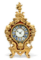 A LOUIS XV ORMOLU-MOUNTED KINGWOOD STRIKING BRACKET CLOCK