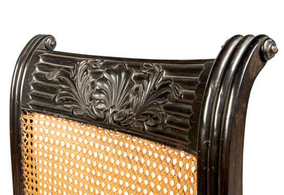 A PAIR OF ANGLO-INDIAN EBONY AND CANED ARMCHAIRS - photo 4