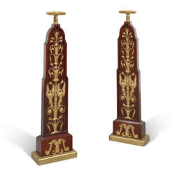 A PAIR OF EMPIRE-STYLE ORMOLU-MOUNTED MAHOGANY DOORSTOPS