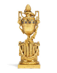 A LATE LOUIS XV ORMOLU PENDULE A CERCLES TOURNANTS