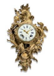 A LOUIS XV ORMOLU STRIKING CARTEL CLOCK