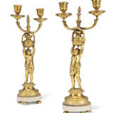 A PAIR OF RESTAURATION ORMOLU AND WHITE MARBLE TWIN-BRANCH CANDELABRA - фото 1
