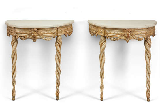 A PAIR OF ITALIAN WHITE-PAINTED AND PARCEL-GILT CONSOLES - фото 1