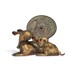 A PARCEL-GILT BRONZE &#39;HARE AND LINGZHI FUNGUS&#39; MIRROR STAND