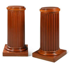 A PAIR OF NORTH EUROPEAN MAHOGANY PEDESTALS