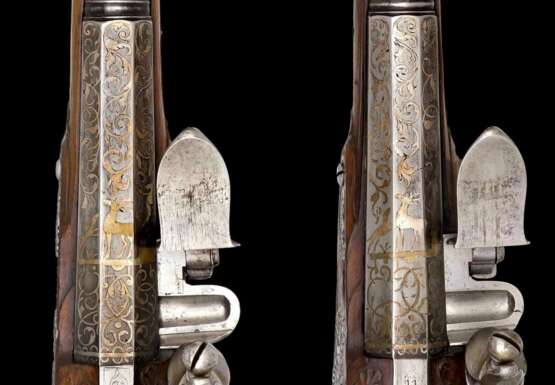 Ein Paar eisengeschnittene Steinschlosspistolen von Caspar Schultz deutsch um 1720. - photo 4
