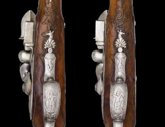 Ein Paar eisengeschnittene Steinschlosspistolen von Caspar Schultz deutsch um 1720. - Foto 8