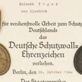 Deutsches Schutzwall-Ehrenzeichen in besonderer Ausführung mit Urkunde. - photo 2
