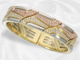 Exceptionally crafted gold bangle with fine diamon…