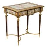 A magnificent ladies table with gilded bronze decor and porcelain panels in the style of Adam Weisweiler. France. 19th century Porcelain Hand Painted Gilding Napoleon III 19th century - photo 1