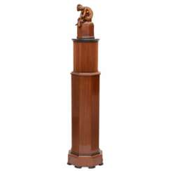 Console column in Art Deco style. With a carved figure of a nude lady and a fox. 20th century. 