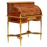 E.KAHN. A magnificent cylindrical bureau in mahogany and satin wood with gilt bronze. Gilded bronze 19th century - photo 1