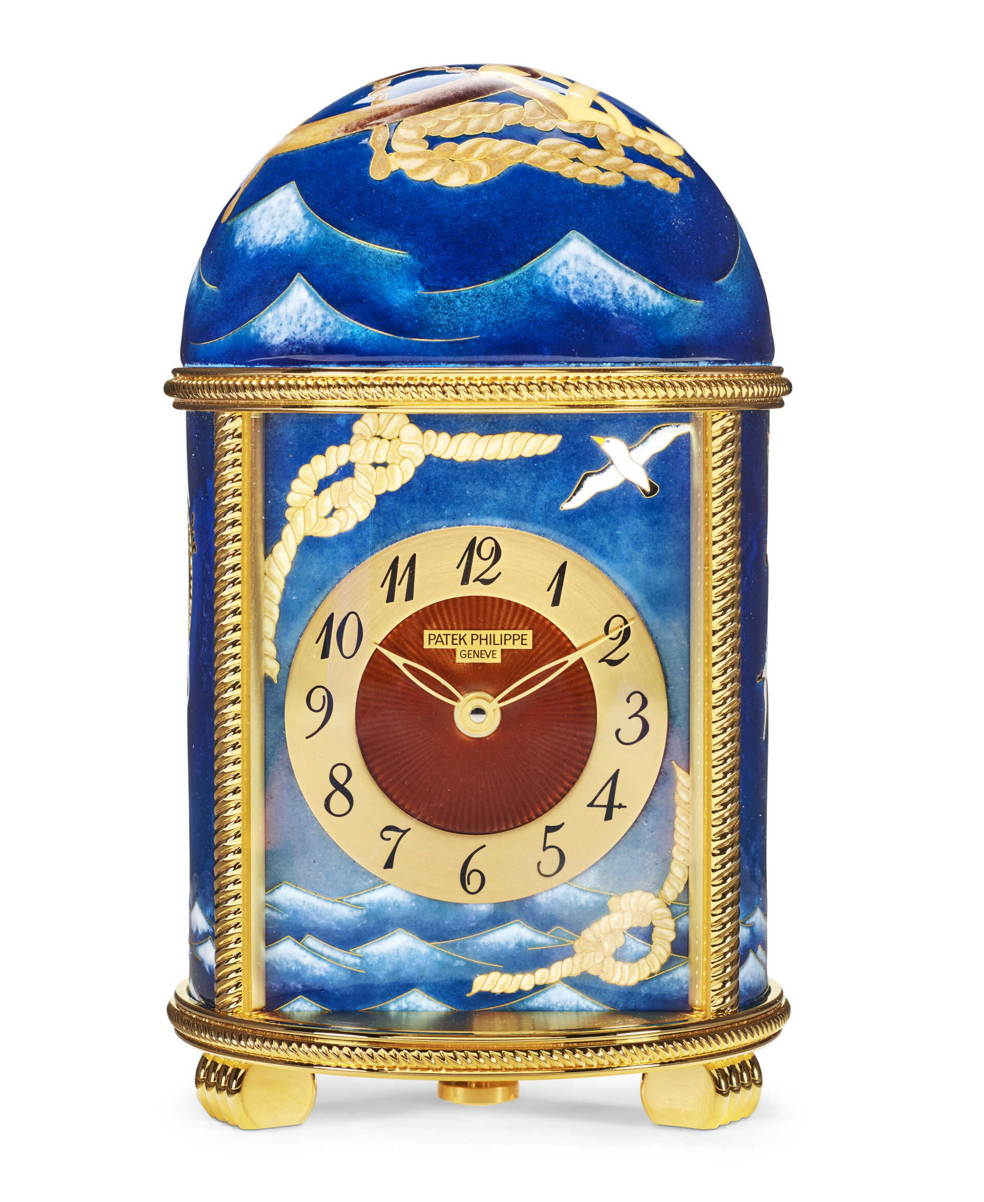 PATEK PHILIPPE. AN EXCEPTIONL AND UNIQUE GILT BRASS DOME TABLE CLOCK WITH ‘OCEAN-GOING VESSELS’ CLOISONN&#201; ENAMEL DECORATION