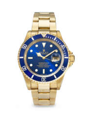 ROLEX. AN ATTRACTIVE AND HEAVY 18K GOLD AUTOMATIC WRISTWATCH WITH SWEEP CENTER SECONDS, DATE AND BRACELET