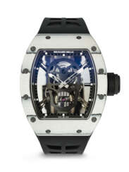 RICHARD MILLE. AN EXTREMELY RARE AND HIGHLY ATTRACTIVE LIGHTWEIGHT LIMITED EDITION WHITE QUARTZ CARBON TPT&#174; SKELETONIZED TOURBILLON WRISTWATCH WITH DIAMOND-SET SKULL