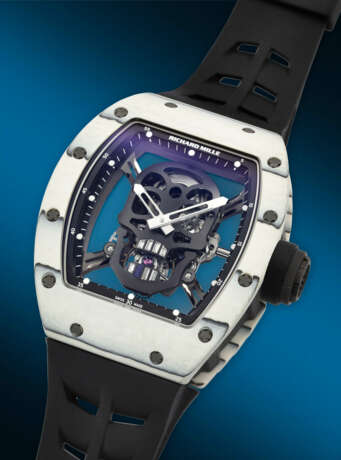 RICHARD MILLE. AN EXTREMELY RARE AND HIGHLY ATTRACTIVE LIGHTWEIGHT LIMITED EDITION WHITE QUARTZ CARBON TPT&#174; SKELETONIZED TOURBILLON WRISTWATCH WITH DIAMOND-SET SKULL - фото 2