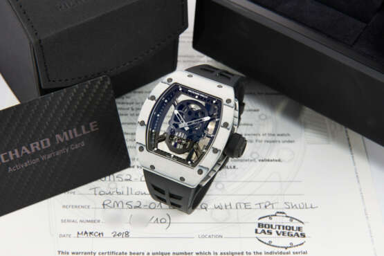 RICHARD MILLE. AN EXTREMELY RARE AND HIGHLY ATTRACTIVE LIGHTWEIGHT LIMITED EDITION WHITE QUARTZ CARBON TPT&#174; SKELETONIZED TOURBILLON WRISTWATCH WITH DIAMOND-SET SKULL - photo 3