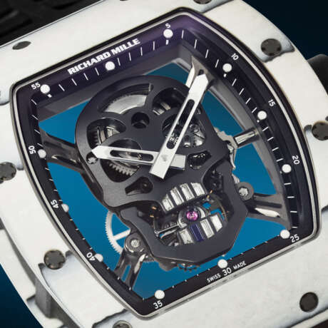 RICHARD MILLE. AN EXTREMELY RARE AND HIGHLY ATTRACTIVE LIGHTWEIGHT LIMITED EDITION WHITE QUARTZ CARBON TPT&#174; SKELETONIZED TOURBILLON WRISTWATCH WITH DIAMOND-SET SKULL - photo 5