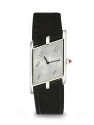 CARTIER. A RARE AND UNUSUAL PLATINUM LIMITED EDITION ASYMMETRICAL WRISTWATCH