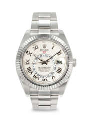 ROLEX. AN ATTRACTIVE 18K WHITE GOLD AUTOMATIC ANNUAL CALENDAR DUAL TIME WRISTWATCH WITH SWEEP CENTRE SECONDS AND BRACELET
