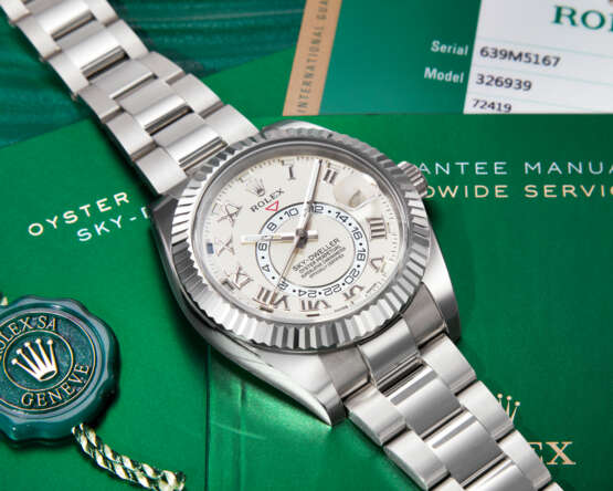 ROLEX. AN ATTRACTIVE 18K WHITE GOLD AUTOMATIC ANNUAL CALENDAR DUAL TIME WRISTWATCH WITH SWEEP CENTRE SECONDS AND BRACELET - фото 3