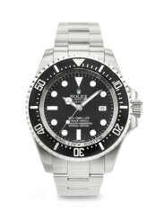 ROLEX. A STICKERED AND &#39;UNWORN&#39; STAINLESS STEEL WRISTWATCH WITH SWEEP CENTER SECONDS, DATE AND BRACELET