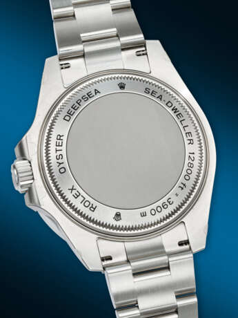 ROLEX. A STICKERED AND `UNWORN` STAINLESS STEEL WRISTWATCH WITH SWEEP CENTER SECONDS, DATE AND BRACELET - photo 4