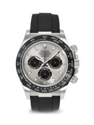 ROLEX. AN ATTRACTIVE AND SPORTY 18K WHITE GOLD AUTOMATIC CHRONOGRAPH WRISTWATCH