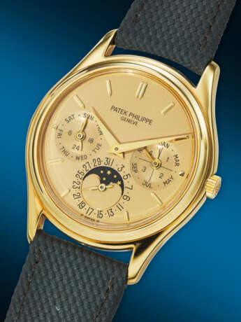 PATEK PHILIPPE. AN EXTREMELY RARE AND HIGHLY COVETED 18K GOLD AUTOMATIC PERPETUAL CALENDAR WRISTWATCH WITH MOON PHASES AND ‘GILT’ DIAL - фото 2