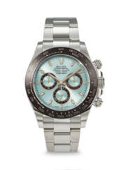 ROLEX. AN IMPRESSIVE AND HEAVY PLATINUM AUTOMATIC CHRONOGRAPH WRISTWATCH WITH BRACELET