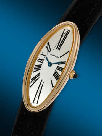 CARTIER. AN ATTRACTIVE 18K PINK GOLD CURVED WRISTWATCH - photo 2