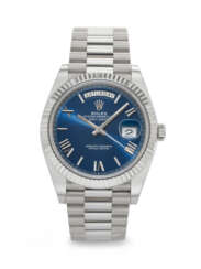 ROLEX. AN ATTRACTIVE 18K WHITE GOLD AUTOMATIC WRISTWATCH WITH SWEEP CENTER SECONDS, DAY, DATE AND BRACELET