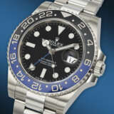 ROLEX. A COVETED STAINLESS STEEL AUTOMATIC DUAL TIME WRISTWATCH WITH SWEEP CENTER SECONDS, DATE, AND BRACELET - фото 2