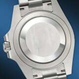 ROLEX. A COVETED STAINLESS STEEL AUTOMATIC DUAL TIME WRISTWATCH WITH SWEEP CENTER SECONDS, DATE, AND BRACELET - photo 4
