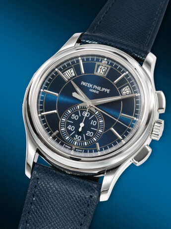 PATEK PHILIPPE. AN ATTRACTIVE PLATINUM AUTOMATIC ANNUAL CALENDAR FLYBACK CHRONOGRAPH WRISTWATCH WITH DAY/NIGHT INDICATOR - photo 2