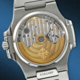 PATEK PHILIPPE. A VERY RARE STAINLESS STEEL AUTOMATIC WRISTWATCH WITH SWEEP CENTER SECONDS, DATE, AND BRACELET - photo 3