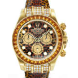 ROLEX. A RARE AND EXUBERANT 18K GOLD, DIAMOND, AND YELLOW SAPPHIRE-SET AUTOMATIC CHRONOGRAPH WRISTWATCH WITH LEOPARD-PRINT DIAL - фото 1