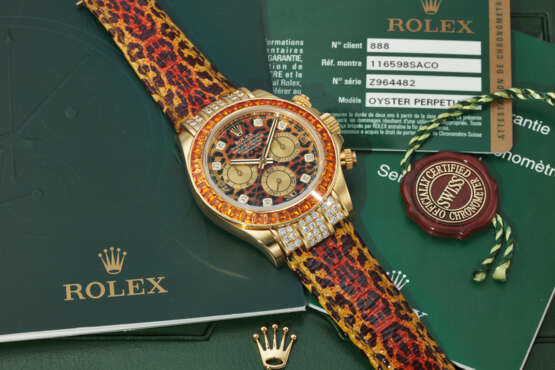 ROLEX. A RARE AND EXUBERANT 18K GOLD, DIAMOND, AND YELLOW SAPPHIRE-SET AUTOMATIC CHRONOGRAPH WRISTWATCH WITH LEOPARD-PRINT DIAL - photo 3