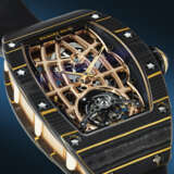 RICHARD MILLE. AN EXCEPTIONAL AND HIGHLY ATTRACTIVE GOLD CARBON TPT&#174;, 18K RED, YELLOW GOLD, AND TITANIUM ULTRA-SKELETONIZED AUTOMATIC TOURBILLON WRISTWATCH - photo 5