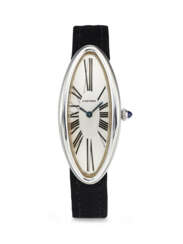 CARTIER. AN ATTRACTIVE 18K WHITE GOLD CURVED WRISTWATCH