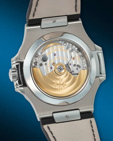 PATEK PHILIPPE. AN ATTRACTIVE STAINLESS STEEL AUTOMATIC ANNUAL CALENDAR WRISTWATCH WITH SWEEP CENTER SECONDS, MOON PHASES AND 24-HOUR INDICATION - photo 4