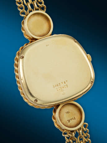 PIAGET. A HIGHLY RARE AND OPULENT 18K GOLD AND TIGER`S EYE NECKLACE WATCH - фото 3