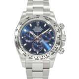 ROLEX. AN ATTRACTIVE AND COVETED 18K WHITE GOLD AUTOMATIC CHRONOGRAPH WRISTWATCH WITH BRACELET - photo 1