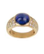 Product catalog. Gold ring with sapphire and diamonds. 