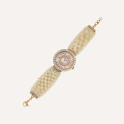 CHOPARD LADY'S MOTHER-OF-PEARL, SEED PEARL AND DIAMOND 'HAPPY DIAMONDS' WRISTWATCH
