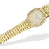 Armbanduhr: sehr schwere und große vintage Luxus- Herrenuhr im Ellipse-Jumbo-Design, Marke "Geneve" mit reichlich Brillantbesatz, Handarbeit, 18K Gold - photo 3