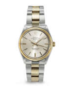 Yellow gold. ROLEX, RETAILED BY TIFFANY & CO., 14K YELLOW GOLD AND STAINLESS STEEL 'AIR-KING,' REF. 5501